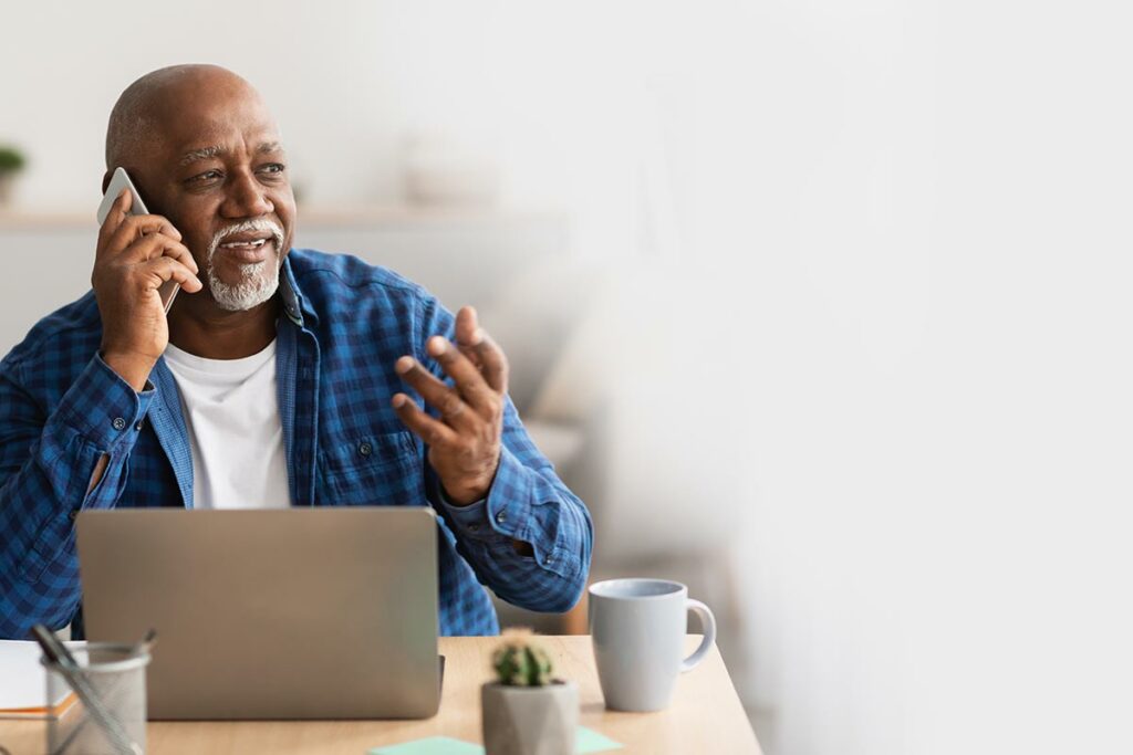 Older man looking at phone